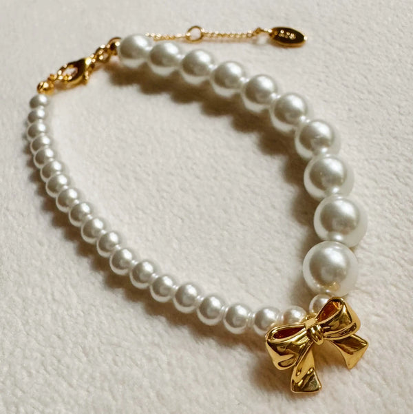 Dangle Bow Pearl Bracelet – 18K Gold‑Plated Brass & Glass Pearls